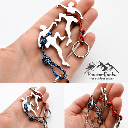 A hand holds a silver metal keychain with three running athlete silhouettes and braided cords in blue, red, and blue/red. The image includes a logo for 'ParacordJanka' and three smaller inset views showing the keychain from different angles in a hand.